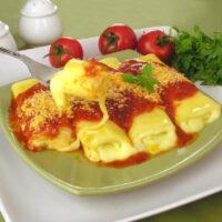 Canelone de Panqueca Recheado com Quatro Queijos e Mel Picante: 5 Segredos Que Fazem Essa Receita Explodir em Sabor na Primeira Mordida